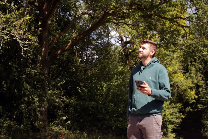 man walking in the forest